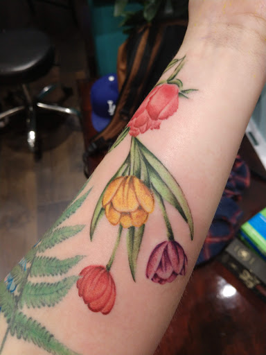 Explore 2 child tattoo ideas for dad, creative tattoo ideas in San Diego, available at Buju Tattoo