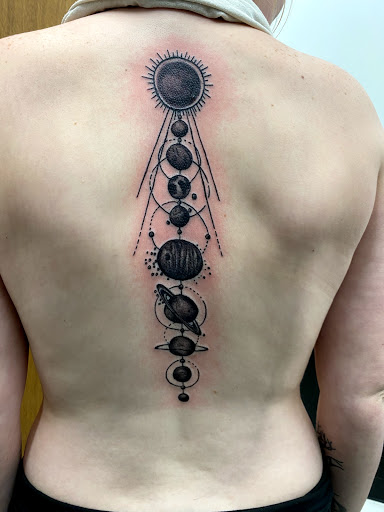 Explore color flower tattoo ideas, creative tattoo ideas in Lawton, available at Impact Ink Tattoo Studios