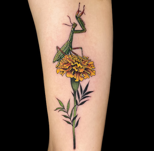 Explore sunflower thigh tattoo ideas, creative tattoo ideas in Bellefonte, available at Juniper Studio