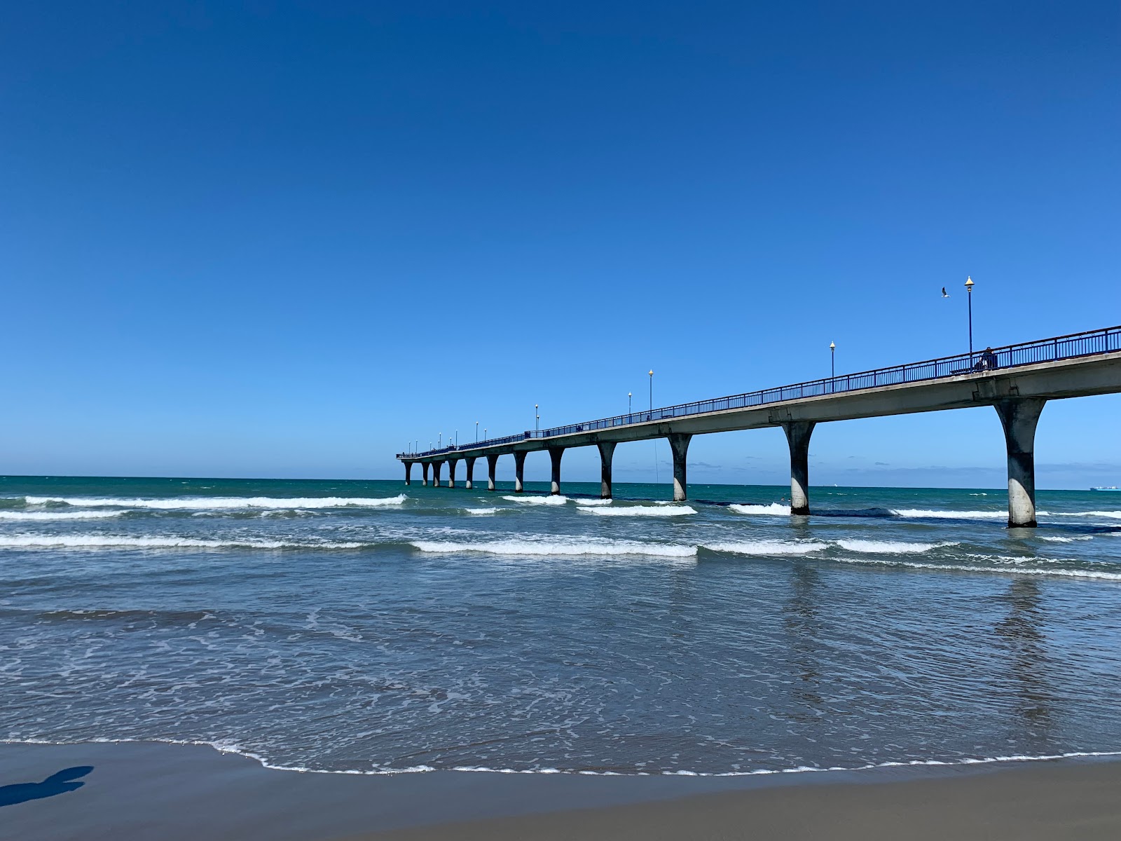 Foto av New Brighton Beach med lång rak strand