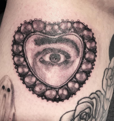 Explore physics tattoo ideas, creative tattoo ideas in Milwaukee, available at Bay Street Tattoo Co.