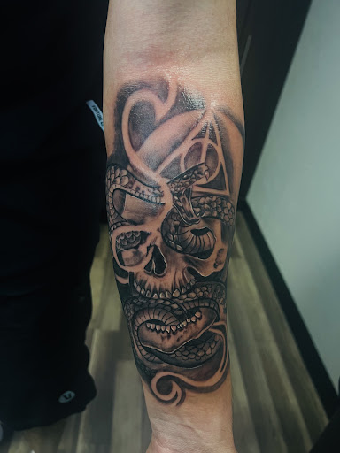 Explore trinity tattoo ideas, creative tattoo ideas in Glendale, available at Urban Legends Tattoo and Piercing LLC