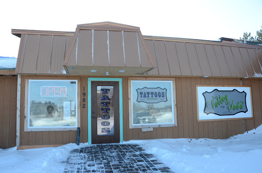 Find tattoo ideas with trees for your next unique tattoo in Osceola at Valley Of The Inkd