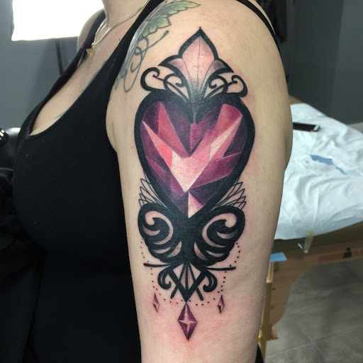 Explore fingerprint heart tattoo ideas, creative tattoo ideas in Chicago, available at Master Craft Tattoo Co.