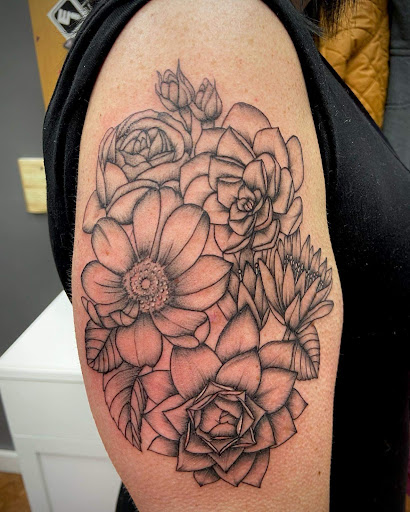 Explore family portrait tattoo ideas, creative tattoo ideas in Shelbyville, available at Stage Left Tattoo and Piercing