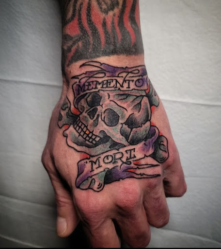 Explore easy hand tattoo ideas, creative tattoo ideas in Peabody, available at Thousand Needles Tattoo