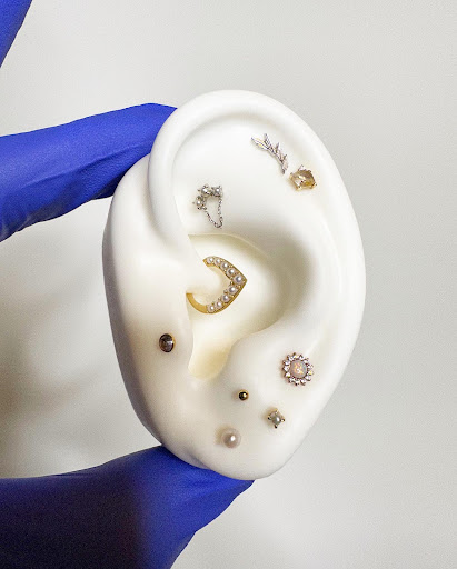 Explore forearm name tattoo ideas, creative tattoo ideas in Chicago, available at Identity Body Piercing