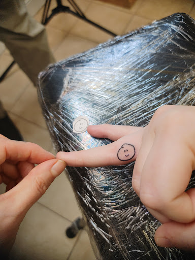 Explore down syndrome tattoo ideas, creative tattoo ideas in Brick, available at Radiant Energy Tattoo