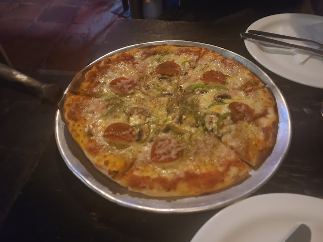 Roy's Pizzería - Quito