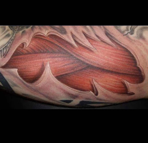 Explore colorful flower tattoo ideas, creative tattoo ideas in Lewes, available at Ancient Art Tattoo & Piercing Studio