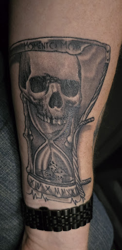 Explore lion cub tattoo ideas, creative tattoo ideas in Angola, available at Hoodlum Ink