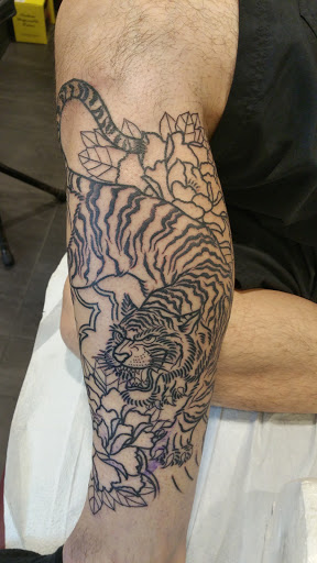 Explore dog ears tattoo ideas, creative tattoo ideas in Covina, available at Inflictions Body Art