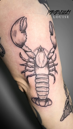 Explore puppy tattoo ideas, creative tattoo ideas in Newfield, available at Parabellum Tattoo Studio