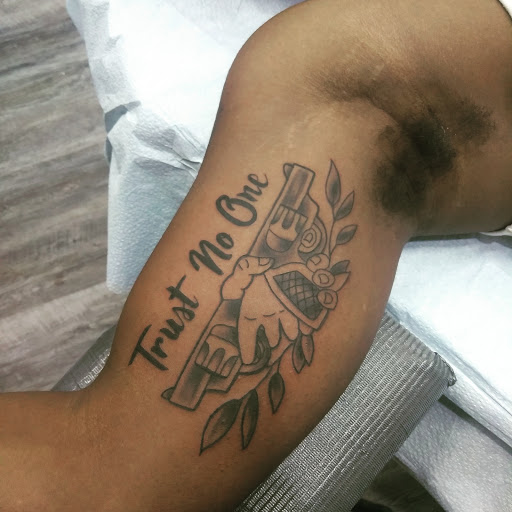 Explore cover up tattoo ideas on forearm, creative tattoo ideas in North Salt Lake, available at Saber House Tattoo