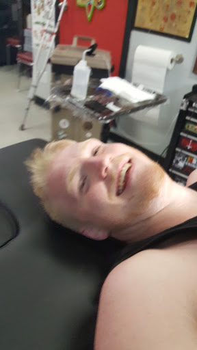 Explore floral tattoo cover up ideas, creative tattoo ideas in Madison, available at Steves Tattoo & Body Piercing