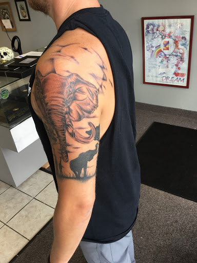 Explore chest piece tattoo ideas woman, creative tattoo ideas in Warren, available at Tattoo X