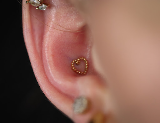 Explore outer thigh tattoo ideas, creative tattoo ideas in West Palm Beach, available at Wooden Heart Tattoos and Piercings