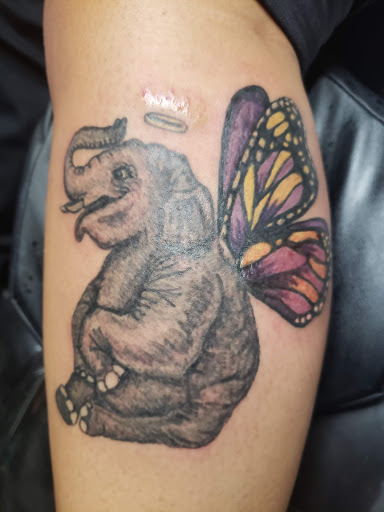 Explore africa tattoo ideas, creative tattoo ideas in Erie, available at EliKingInk