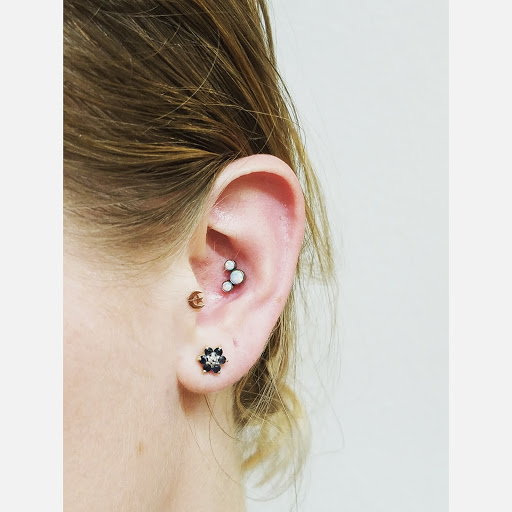 Find playboy bunny tattoo ideas for your next unique tattoo in Athens at 3 Ravens Tattoo & Piercing