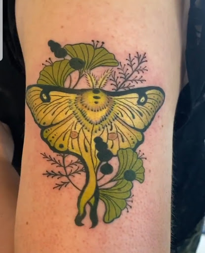 Explore cross tattoo ideas for women, creative tattoo ideas in Warrensburg, available at FrankenBeans Tattoo Studio