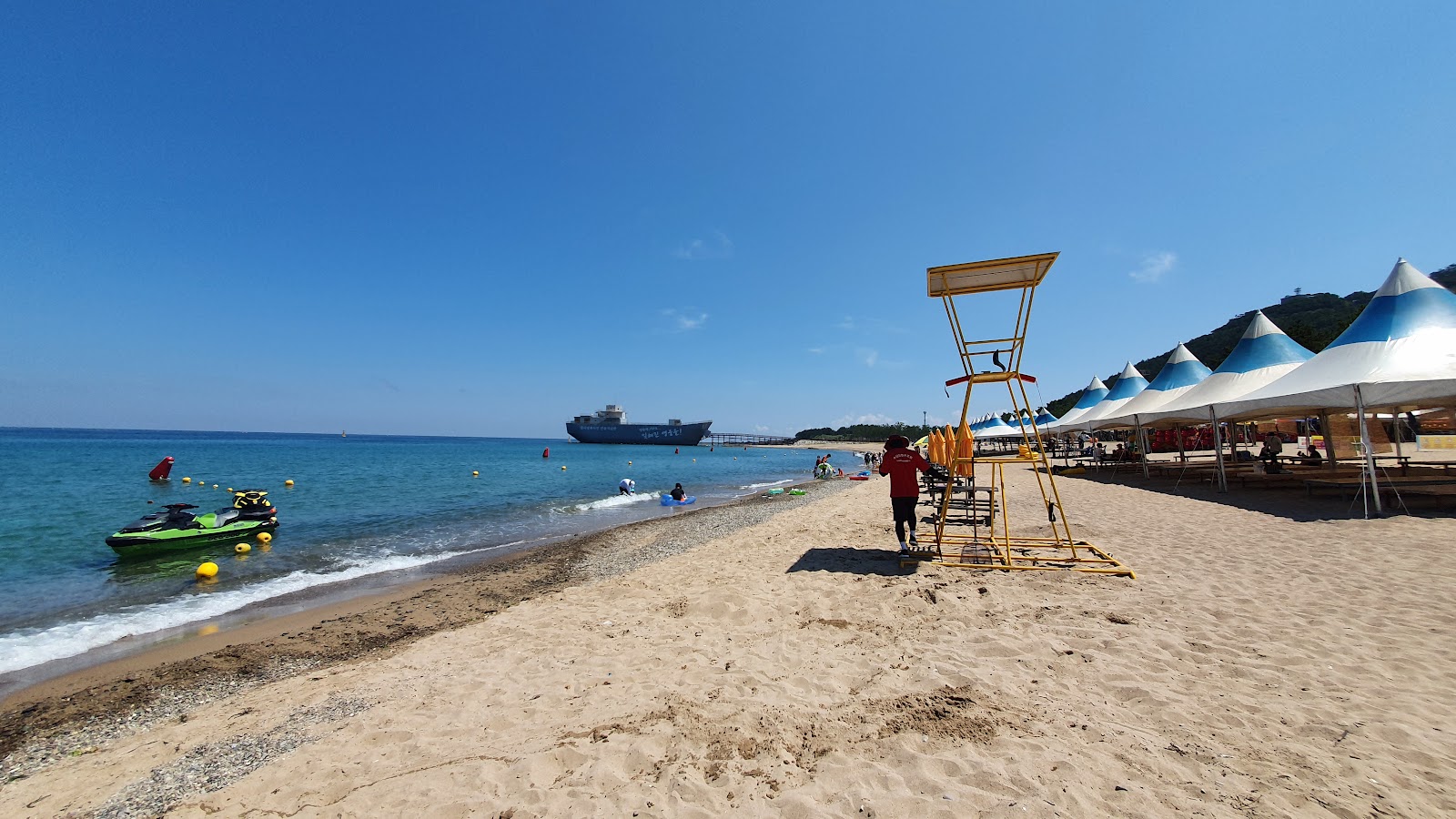 Jangsa Beach'in fotoğrafı çok temiz temizlik seviyesi ile