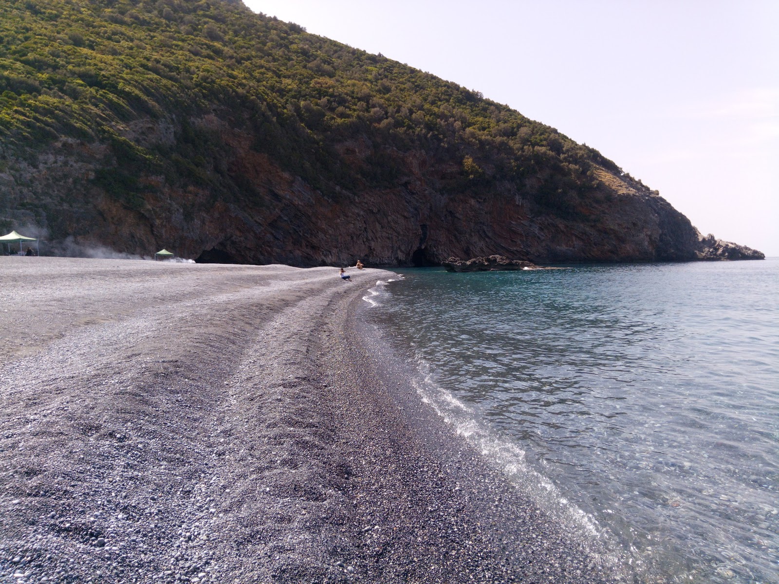 Foto av Petali Stranden med turkos rent vatten yta