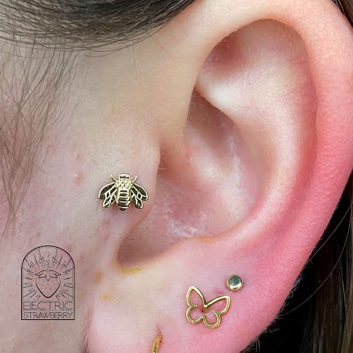 Explore cake tattoo ideas, creative tattoo ideas in Saint Paul, available at Electric Strawberry Piercing