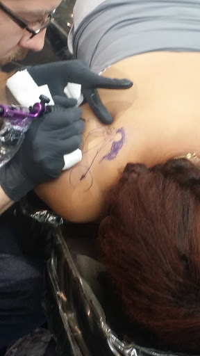 Find good tattoo ideas for females for your next unique tattoo in Milford at Controlled Abrasions