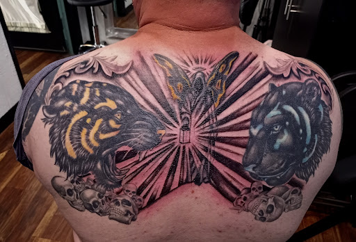 Explore tattoo ideas for triceps, creative tattoo ideas in Logan, available at Sacred Embers Tattoo