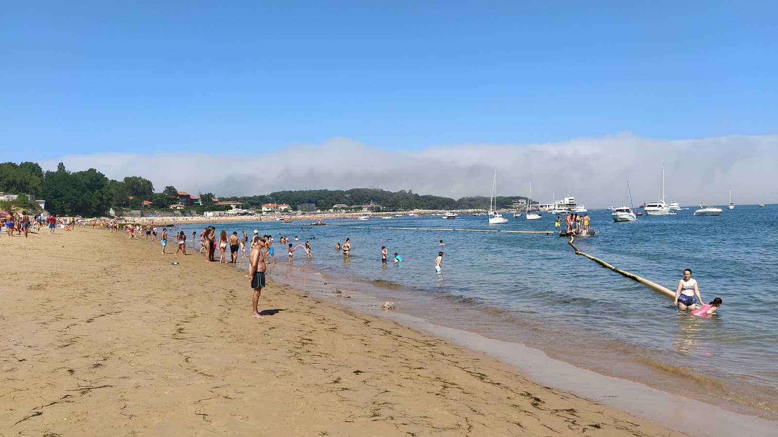 Foto von Playa de la Magdalena mit geräumige küstenlinie