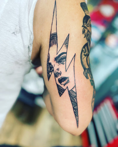 Explore basketball tattoo ideas, creative tattoo ideas in Mount Holly, available at Permanent Vacation Tattoos