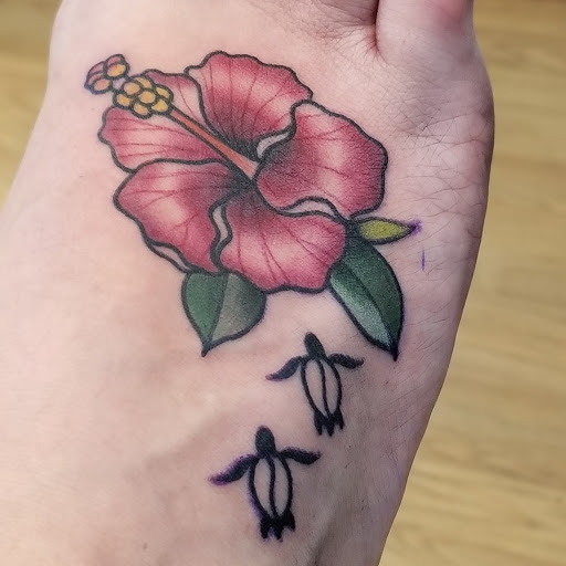 Explore rubber duck tattoo ideas, creative tattoo ideas in Lahaina, available at Sweet Trade Tattoo