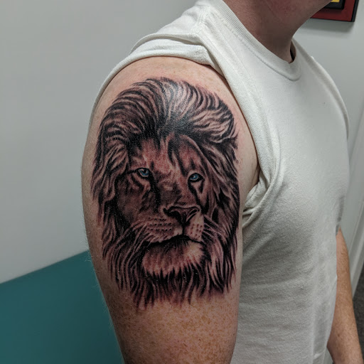 Explore small tattoo ideas for men's arms, creative tattoo ideas in New Bern, available at Ol Skool Tattoos
