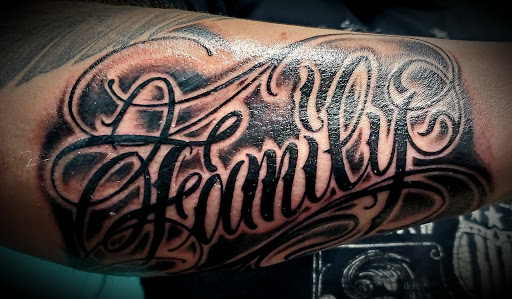 Explore koi sleeve tattoo ideas, creative tattoo ideas in Osceola, available at Valley Of The Inkd