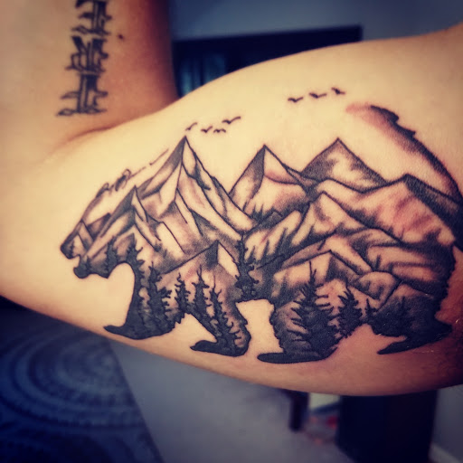 Explore women arm tattoo ideas, creative tattoo ideas in Milford, available at Delaware Branding Company