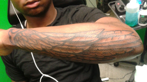 Tattoo Shop «Infamous Tattoos», reviews and photos, 3530 Flat Shoals Rd A, Decatur, GA 30034, USA