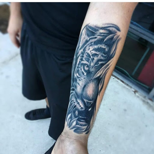 Explore bearded dragon tattoo ideas, creative tattoo ideas in Atlantic Beach, available at The Ink Chamber Tattoo Parlor