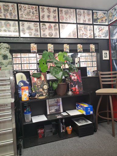 Explore may birth flower tattoo ideas, creative tattoo ideas in Tucson, available at Enchanted Dragon