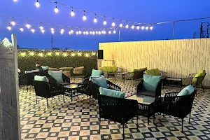 The Roof Yard Café ( Cafe TRY) - fine dine restaurant/ family restaurant/ rooftop cafe / Dwarka image
