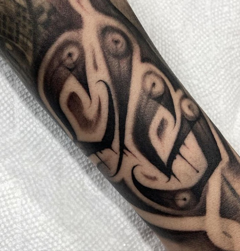 Explore tattoo ideas for sons, creative tattoo ideas in San Antonio, available at Firme Copias Tattoo Studio