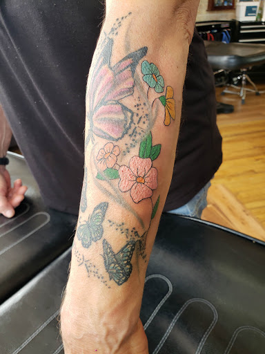 Find lunar moth tattoo ideas for your next unique tattoo in Platteville at Legacy Impressions Tattoos & Piercings