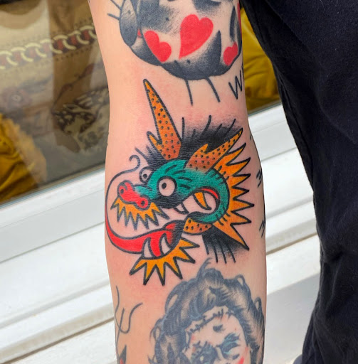 Explore small hand tattoo ideas, creative tattoo ideas in Glenside, available at Yellow Rose Tattoo