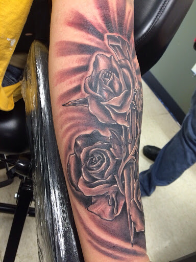 Explore tattoo ideas for son on mom, creative tattoo ideas in Fargo, available at Golden Dragon Tattoo