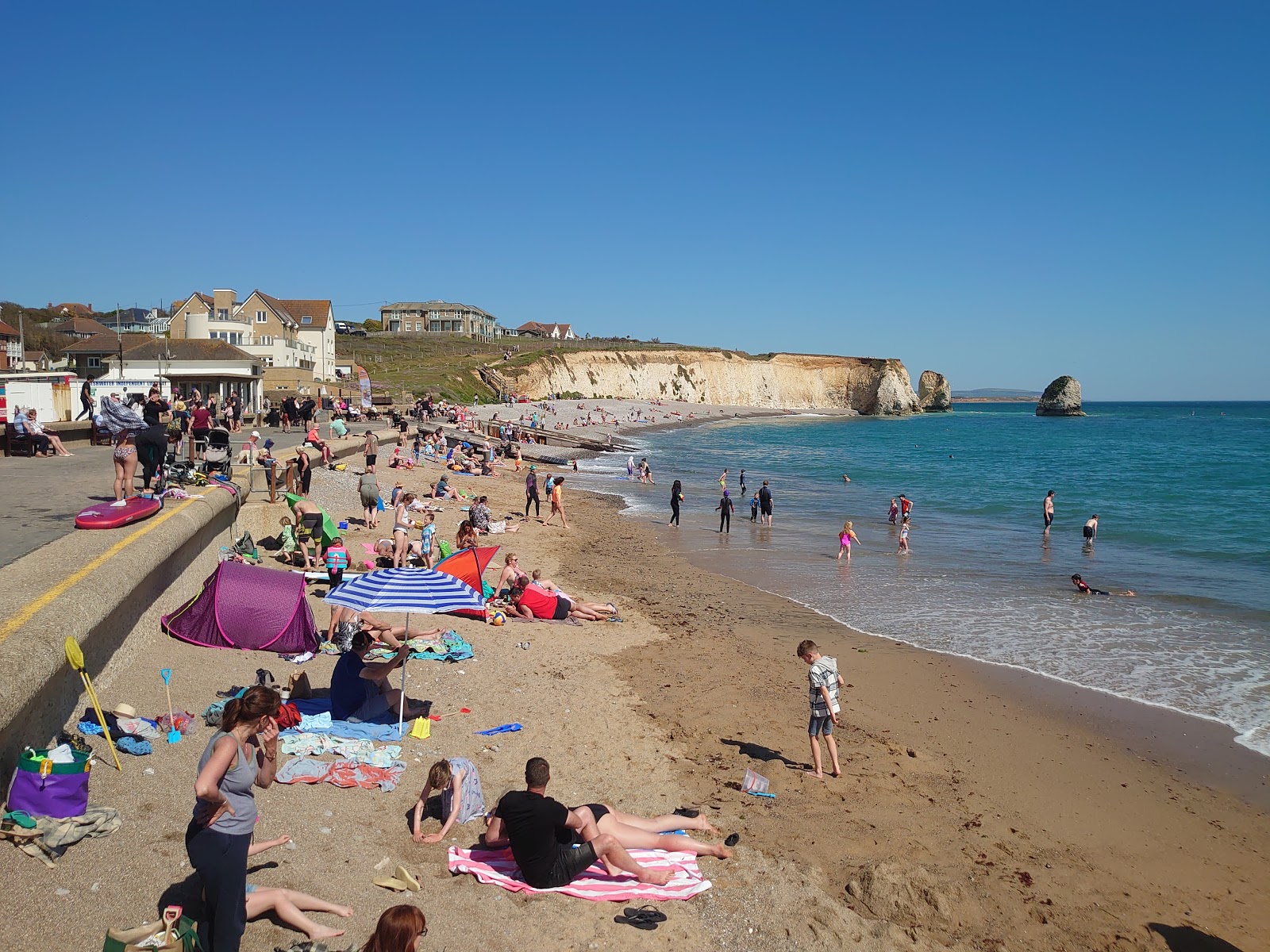 Freshwater Bay'in fotoğrafı geniş bir kıyı şeridi ile birlikte