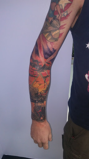 Explore tom and jerry tattoo ideas, creative tattoo ideas in Knoxville, available at Archangel Custom Ink Tattoo & Piercing