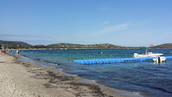 Photo de Plage de Pinarellu III partiellement zone de villégiature