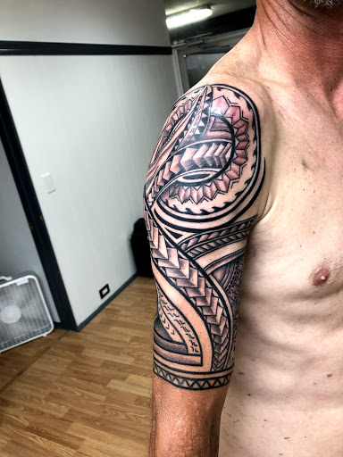 Explore boxer dog tattoo ideas, creative tattoo ideas in Sarasota, available at SEVEN SINS Tattoo Studio