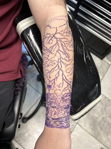 Explore last name back tattoo ideas, creative tattoo ideas in Slidell, available at Real Ink Tattoos & Piercings