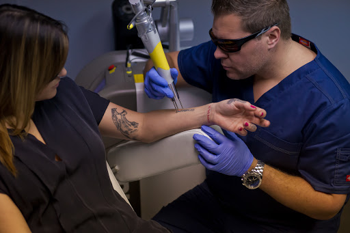 Explore flower arm sleeve tattoo ideas, creative tattoo ideas in Livonia, available at Ink Blasters Precision Laser Tattoo Removal