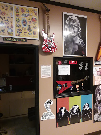 Explore backpiece tattoo ideas, creative tattoo ideas in Wilson, available at New Addiction Tattoos